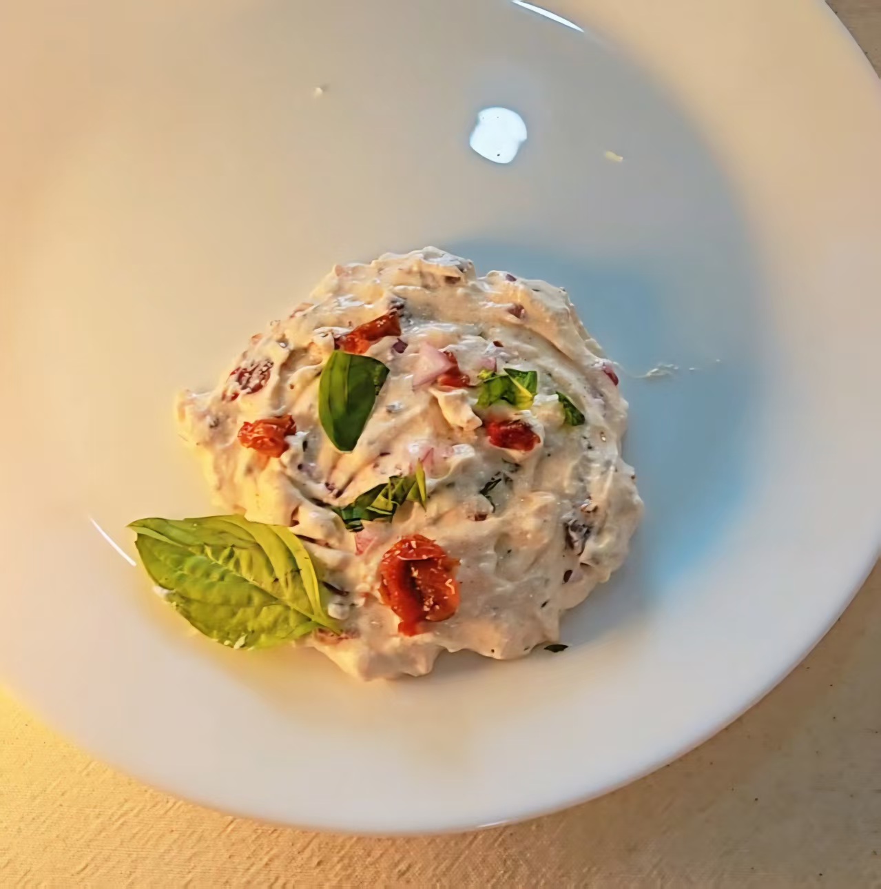 Labneh plated in a bowl